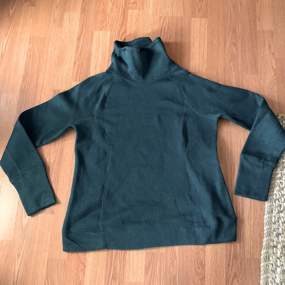 green sweater